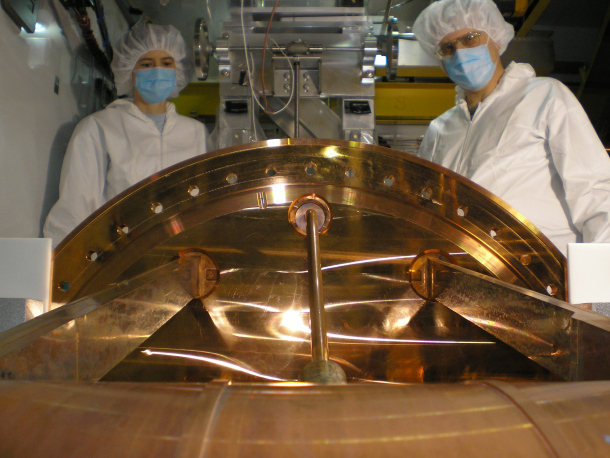 Michelle Dolinski and an engineer during the installation of the EXO-200 detector