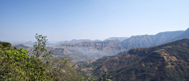 The entire mountanous region shown here is part of the Deccan Traps, showing the characteristic stair-like ridges of lava flows. This photo is from near the town of Mahabaleshwar. Credit: Loÿc Vanderkluysen